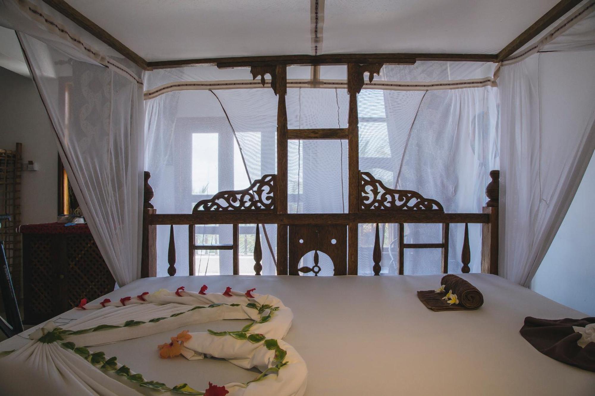 Moonshine Uroa Boutique Hotel Bilik gambar